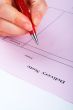 Writing blank delivery note with pen