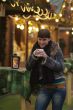 young woman drinks glogg