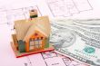 House and dollar bills