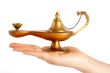 Old brass oil lamp on the hand