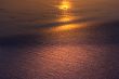 golden rays of sunlight on sand