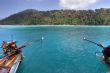 longtails boats on turquoise