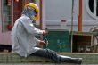 malaysian worker under the sun