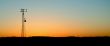Pale Blue Cell Phone Tower Sunset