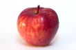 red and yellow apple with dewdrop
