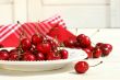 Red cherries on a plate