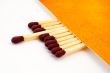 One match stick spent among match sticks