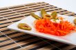 Salad of carrot on a porcelain plate