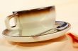 Close-up of a cup of coffee with the spoon