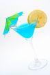 Blue cocktail with lemon and umbrella