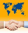 Business handshake under the world