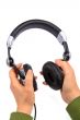 Woman holding earphones