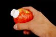 holding apple with spout