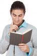 attractive boy reading a book