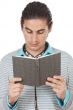 Teen reading a book