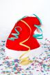 Christmas hat with ribbons and confetti