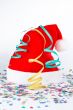 Christmas hat with ribbons and confetti