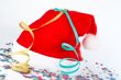 Christmas hat with ribbons and confetti