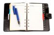 Opened agenda with the pen