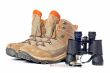 Hiking boots, compass and binoculars