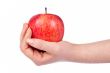 Holding a red apple