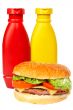 Burger with mustard and ketchup bottles