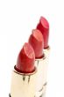 Three tubes of red lipstick