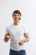 juggling green apples