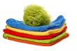 Multicolour towels stacked and body sponge
