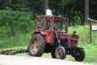 Tractor dragging lumber