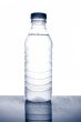 Bottle of mineral water with droplets