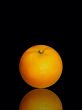 fresh and juicy orange on black