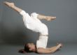 woman makes yoga