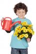 adorable boy with flowers