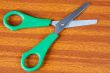 green scissors on a table