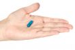 Hand with a pill