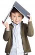 adorable boy reading a book
