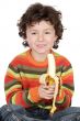 child eating a banana