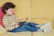 adorable boy reading