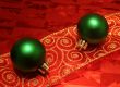 Two Green Balls on a Ribbon