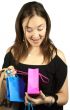 girl looking at present inside - gift bags