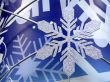 Snowflake in blue background