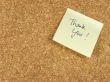 Thank you note on corkboard