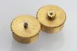 two old gold-coloured cogwheels