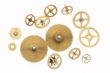 many old gold-coloured cogwheels