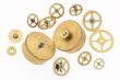 thirteen old gold-coloured little cogwheels