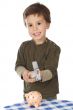 adorable boy breaking the money box