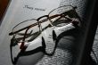 spectacles and book