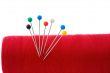 red thread ball of yarn