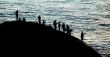 Anglers at sunset